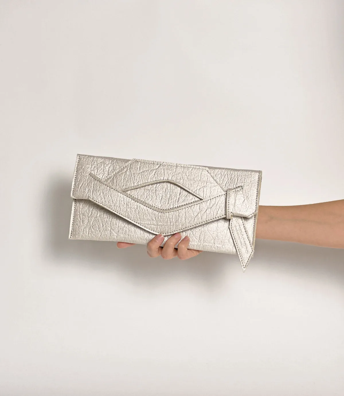 Mini Triangular Slashed Clutch - Warm Pearl White